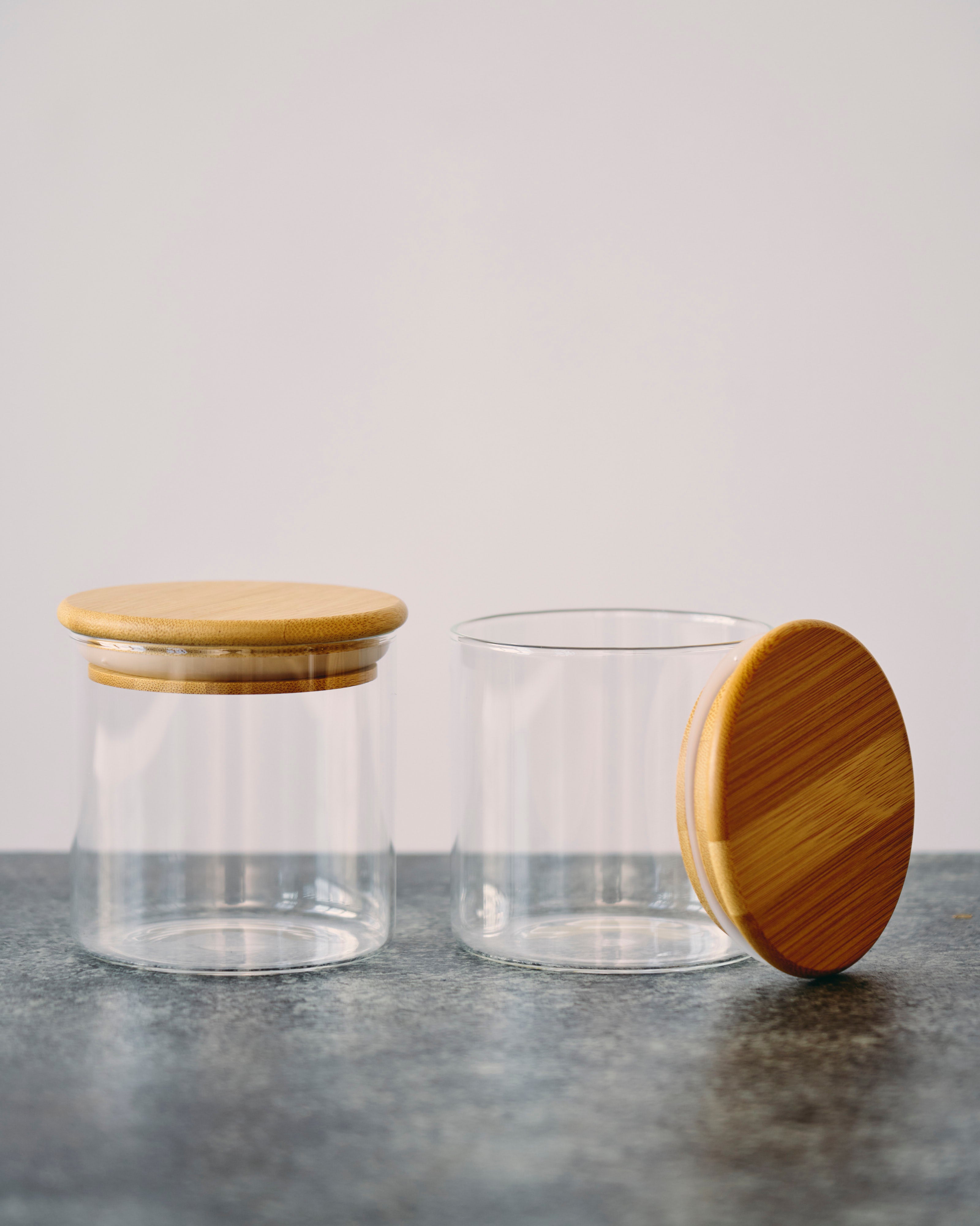 Two Glass Storage Jars