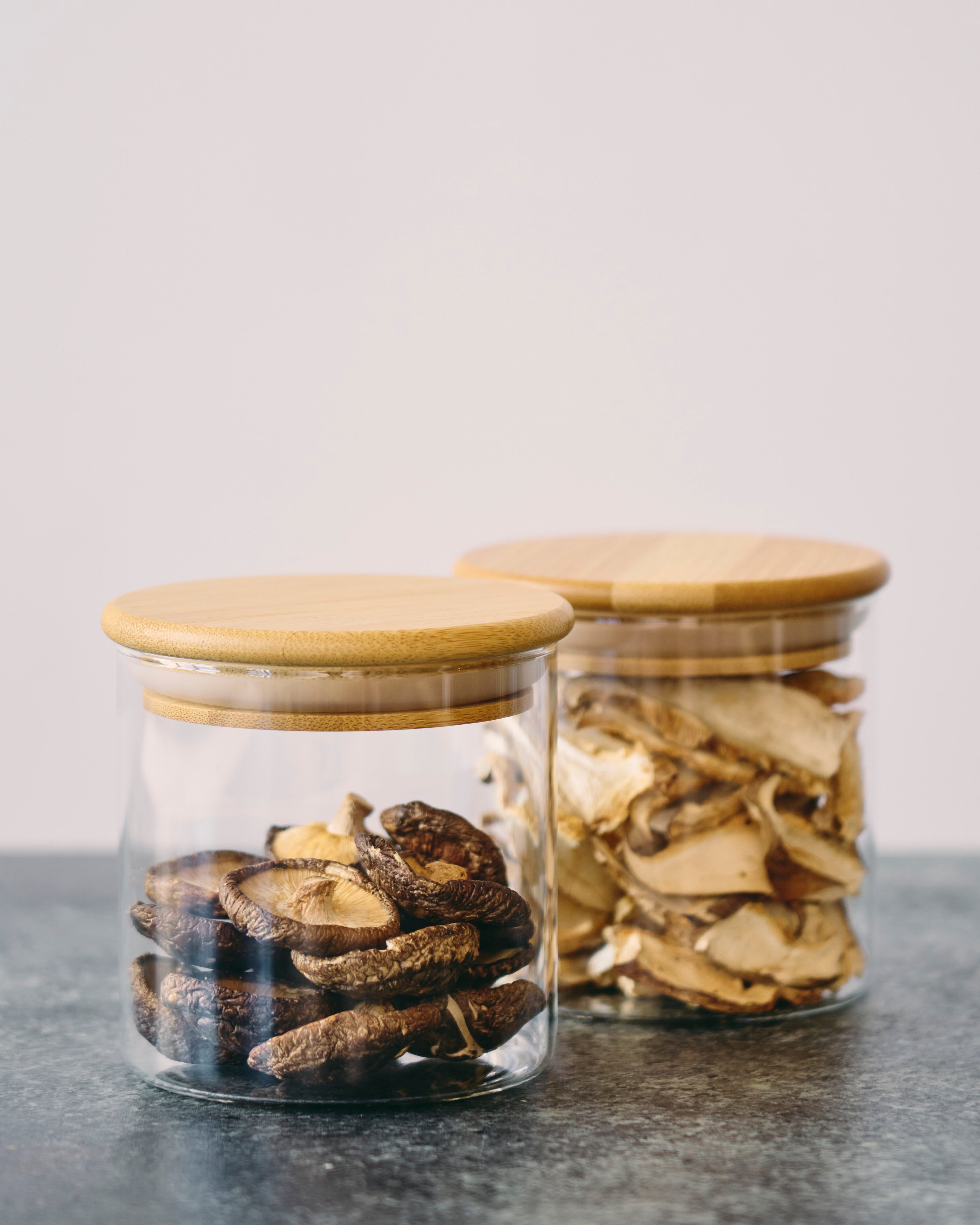 Two Glass Storage Jars